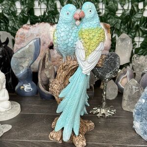 Beautiful two blue birds sitting on a bark home decor